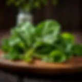 Fresh green spinach leaves on a wooden table